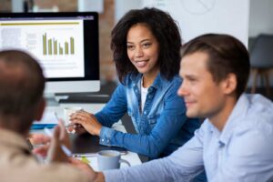 People Using Digital Device While Meeting (2) (1) - NFP Contabilidade